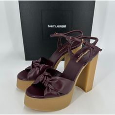 Saint Laurent Women's Bianca Node High Heel Platform Sandals Color: Wine Red Size: 38+ (Us 8.5) Retail: $1,050 Condition: Brand New In Box *Fits True To Size, Order Your Normal Size *Open Toe *Buckled Ankle Strap *Knot Detail At Toe Strap *5.5" Heel, 2" Platform, Feels Like 3.5" Heel *Leather Upper And Lining, Rubber Sole *Made In Italy Patent Leather Sandals With Wrapped Heel And Round Toe, Luxury Burgundy Heels For Evening, Formal Sandals With Red Sole And Round Toe, Formal Sandals With Round Toe And Red Sole, Burgundy Sandals With Round Toe For Evening, Formal Open Toe Sandals With Red Sole, Burgundy Open Toe Sandals For Evening, Designer High Heel Sandals With Red Sole, Luxury Brown Heels With Red Sole