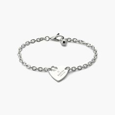 From the cut-out heart to the padlock charm, playful symbols continue to distinguish the jewelry for Pre-Fall 2024. This Gucci bracelet, crafted in sterling silver, features Gucci's trademark engraving on a heart pendant. Gucci Sterling Silver Jewelry With Heart Charm, Gucci Sterling Silver Anniversary Jewelry, Gucci Sterling Silver Jewelry For Anniversary, Elegant Gucci Jewelry With Heart Charm, Silver Sterling Silver Name Bracelet For Promise, Classic Sterling Silver Charm Bracelet With Heart, Gucci Jewelry With Heart Charm, Gucci Engraved Jewelry For Anniversary, Gucci Jewelry With Heart Charm As A Gift