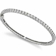 This classic eternity bangle bracelet is set with fine diamonds that weigh a total of 2.48ct. The hinged bangle is made out of solid 14k white gold and weighs 11 grams. Fancy Bracelet, Bracelet Stone, Hinged Bracelet, Diamond Eternity, Hinged Bangle, White Rose Gold, Moissanite Diamonds, Bracelet Sizes, Bangle Bracelet