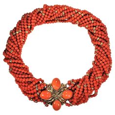 WORLDWIDE FREE UPS EXPRESS SHIPPING ABOVE 200 USD PURCHASE DELIVERY TIME 8 TO 14 DAYS Handmade MATERIAL-  CORAL GEMSTONE - CORAL WITH GOLD  STONE SHAPE - BEADED  ROUND NECKLACE WEIGHT :-  163 GRAMS Discreption:-  This magnificent mid-20th century front closing choker length torsade necklace, has, as the focal point in the front, a beautifully articulated 18k gold plate set with four large orange coral cabochons. The clasp alone measures 1 5/8inches long by 1 5/8 inches wide. The entire necklace connecting to this plate comprises fourteen strands of vivid orange Mediterranean coral beads all with an approximate 3.75mm diameter and with 4mm gold beads interspersed throughout. When twisted to their proper length for wear, the coral strands have a total diameter of approximately 7/8 inches mak Woman Jewelry, Vintage Beads Necklace, Hippie Necklace, Orange Coral, Round Necklace, Coral And Gold, Coral Jewelry, Wedding Jewellery Necklace, Bridal Gold Jewellery