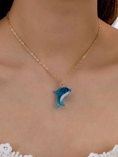 Embrace the magic of the ocean with this Marine Life Dolphin Pendant Necklace, the ultimate summer accessory for your beachside adventures! Crafted with love and inspired by the playful spirit of dolphins, this necklace radiates coastal vibes that will whisk you away to the serene shores of your favorite seaside getaway. Whether you're strolling along the sand, soaking up the sun, or daydreaming of far-off oceans, this pendant will be your stylish reminder of summer's untamed beauty. Add a splash of marine charm to your summer wardrobe--perfect for vacation, gifting, or channeling that beachy spirit year-round! Sea Creature Jewelry, Ocean Spirit, Dolphin Pendant, Nautical Necklace, Dolphin Necklace, Niece Gifts, Fish Necklace, Fish Pendant, Surfer Necklace