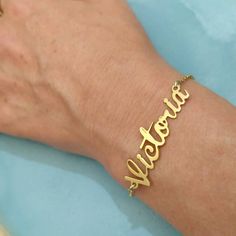 Personalized 14k - Name Bracelet - Solid Gold Bracelet - Custom Name Bracelet - Name Jewelry - Christmas Gift - Personalized Gift - Victoria . . . . . . . . . . . . . . . . . . . . . . . . . . . . . . . . . . . . . . . . . . . . . . . . . . . . . . . . . . . Looking for a thoughtful gift for your loved one? You will love this high quality Personalized 14k Name Bracelet. This is a perfect gift for your girlfriend or wife. This lovely Personalized 14k Solid Gold Name Bracelet is made to order. Pur Custom Name Jewelry Bracelet For Anniversary, Custom Name Bracelet Jewelry For Anniversary, Custom Name Jewelry For Anniversary, Elegant Nameplate Charm Bracelet For Gift, Elegant Nameplate Charm Bracelet Gift, Gold Charm Bracelet Gift, Customized Gold Chain Bracelet For Anniversary, Customizable 14k Gold Bracelet Jewelry, Customizable 14k Gold Bracelet