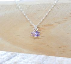 "925 Sterling Silver star charm necklace. One charm is an amethyst and the other one is rose quartz. If you prefer a different stone combination, please contact us! Please choose your favorite necklace length at checkout. All lengths have a one inch extender, that way you'll have some wiggle room to play with the length. For example, if you choose a 14 inches necklace length, you'll have options to close the necklace at any length between 14 inches and 15 inches. ⇒ MATERIALS Entirely made of .92 Dainty Handmade Birthstone Pendant Necklace, Dainty Silver Crystal Necklaces As Gift, Dainty Sterling Silver Crystal Necklace For Gift, Handmade Dainty Sterling Silver Birthstone Necklace, Delicate Purple Sterling Silver Jewelry, Dainty Sterling Silver Crystal Pendant Necklace, Dainty Silver Birthstone Necklace As A Gift For Her, Dainty Sterling Silver Birthstone Necklace, Delicate Sterling Silver Jewelry With Star Charm