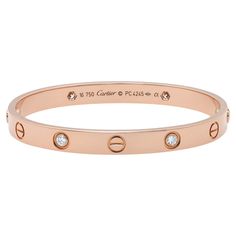 Cartier LOVE bracelet crafted in 18K rose gold, set with 4 round brilliant cut diamonds weighing 0.42 carats. A close fitting, oval bracelet composed of two rigid arcs which are worn on the wrist and removed using a specific screwdriver. Old style screw system. Comes with a screwdriver. Width: 6.1mm. Size 16. Excellent pre-owned condition. The bracelet is marked "Cartier" as well as "16" for the size, "750" for the 18K gold purity, and serial number (as in pictures). Comes with an original box a Oval Bracelet, Diamonds Bracelet, Bracelet Love, Diamond Bangles Bracelet, Love Bracelet, Cartier Love, Bracelet Crafts, Bracelet Bangle, Cartier Love Bracelet