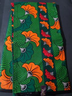 DESCRIPTION Green and Orange Multicolor African Ankara Fabric. This is high quality African print is 100% cotton and it's 45 inches wide. It is used for making African Clothing, African quilts, & For Home decoration. FYI: Print is Double sided. The listing is for Per yard, 6yards and Headwrap For Each piece of fabric measures: 34-36in by 45in for 1yard 105-108in by 45in for 3yards 210-216in by 45in for 6yards 70in by 22in for Head wrap If you purchase more than one yard, you will receive one continuous piece. *If you require more than what I have listed, feel free to send me email. CARE INSTRUCTIONS:•DO NOT BLEACH•Hand wash with cold water and mild soap or Dry clean•Press with warm iron on the wrong side only. Color may be different due to your monitor Traditional Green Cotton Patterns, Traditional Green Printed Fabric, Traditional Green Fabric With Colorful Pattern, Green Traditional Fabric With Colorful Pattern, Green Cotton Fabric With Floral Print, Green Ankara Fabric With Colorful Pattern, Green Printed Ankara Fabric, Black Ankara Fabric With Colorful Pattern, Green Floral Print Cotton Fabric