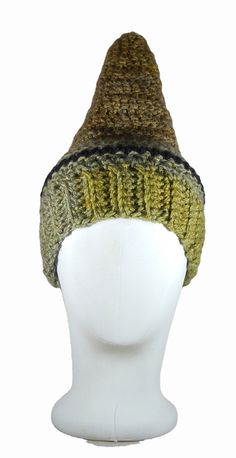 Fun pointy cap to warm your soul. Warm Bonnet Cap For Fall, Warm Fall Bonnet Cap, Winter Beanie Bonnet, One Size Fits Most, Warm Crochet Hat For Winter, One Size Fits Most, Winter Bonnet Beanie One Size Fits Most, Warm Winter Bonnet With Curved Brim, Winter Yarn Bonnet Cap, Warm Outdoor Hat One Size, Winter Knitted Brimmed Cloche Hat