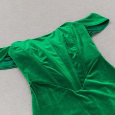 This stunning dress is designed to flatter your curves and accentuate your feminine figure, with an off-shoulder neckline that adds a touch of drama and a corset bodice that cinches your waist. Crafted from high-quality stretch fabric, this dress is both comfortable and stylish. The eye-catching green hue is perfect for those who love to stand out, while the midi length and elegant design make it a versatile choice for a range of occasions. Gentle Dry Clean OnlyColour may vary due to lighting on Elegant Green Strapless Bodycon Dress, Green Fitted Off Shoulder Mini Dress, Green Off-shoulder Mini Party Dress, Green Fitted Corset Dress For Formal Occasions, Green Fitted Corset Dress For Formal Events, Green Strapless Dress With Sweetheart Neckline, Green Strapless Dress With Sweetheart Neckline And Fitted Bodice, Green Strapless Dress With Fitted Bodice, Green Fitted Bodice Corset Dress