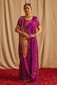 Purple silk saree with all over polka dots bandhani pattern, geometric pattern, lagdi patta on pallu and crochet lace fringe tasselled hem. Comes with contrast yellow blouse fabric.
Component: 2
Pattern: Handwoven
Type Of Work: Bandhani Pattern
Fabric: Silk
Color: Purple
Other Details: 
Contrast pattern border
Fringe tasselled hem on pallu
Lagdi stripe pattern pallu
Note: The blouse and accessory worn by the model is not for sale
Occasion: Sangeet,Destination Wedding - Aza Fashions Purple Bandhani Saree, Polka Dot Saree, Purple Silk Saree, Bandhani Pattern, Contrast Pattern, Bandhani Sarees, Purple Saree, Kalamkari Saree, Saree For Women