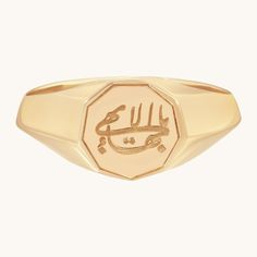 This uniquely shaped all gender 9 sided signet ring is engraved with the Baha’i Greatest Name symbol. Made to order in a high polish finish, it is a simple yet striking testament and reminder of the invocation that translates to “O Thou Glory of Glories!” Read more about the significance of The Greatest Name here. This everyday fine jewelry piece has nine equal sides symbolizing perfection and unity and is available in 14k solid yellow, white and rose gold. Symbolic Signet Ring With Engraving For Promise, 14k Gold Symbolic Rings With Engraving Option, Symbolic Anniversary Signet Ring Tarnish Resistant, Symbolic Yellow Gold Signet Ring For Promise, Symbolic 14k Gold Signet Ring For Promise, Symbolic White Gold Signet Ring For Promise, Symbolic Formal Signet Ring With Polished Finish, Symbolic 14k Engraved Promise Ring, Symbolic Signet Ring With Engraving Option For Formal Events