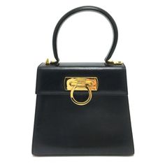 Item Information ▶ITEM NO. G-210225-29 ▶NAME Salvatore Ferragamo Shoulder Gancini Shoulder Bag Hand Bag 2 way bag ▶SHAPE 2way bag bag ▶COLOR Black ▶MATERIAL Leather ▶APPROX SIZE W7.8 x H6.9 x D3.3inch W19.7cm x H17.5cm x D8.5cm Handle:10.2inch 26cm Shoulder:39.8inch 101cm Width measures Base. The height of the bag includes the flap. ▶Gender Women's ▶Spec [Open type]Belt Hardware [Inside] Zipper pocket x 1 ▶ADDITIONAL ITEMS Dust Bag , Shoulder strap , ▶ITEM RANK Used AB Rank ▶CONDITION DETAILS Ou Salvatore Ferragamo Bags, Studio Bag, Suede Handbags, Vintage Shoulder Bag, Leather Baby, Purple Suede, Quilted Leather, Gold Leather, 2 Way