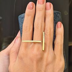 This unique, stylish Brass Double Bar Minimalist Ring will always be the center of attraction. This Open Gold Bar Ring is made of brass. This brass adjustable two bars ring is hammered, textured and polished totaly by hand carefully in our studio. Every piece in our studio is handmade which makes them unique. You will have very similar looking ring but not identical. The ring is adjustable so you can use it on your different fingers. Even so, please select your size via the drop-down menu so tha Gold And Silver Jewelry Together Modern, Cheap Unique Open Midi Rings, Long Bar Ring, Luxury Minimalist Jewelry With Matte Finish, Luxury Minimalist Ring In Recycled Gold, Luxury Minimalist Rings As A Gift, Cheap Minimalist Metal Ring, Adjustable Unique Rings, Luxury Minimalist Bands For Formal Occasions