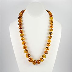 25" Baltic Amber Necklace $375.00 Luxury Round Amber Jewelry, Luxury Amber Jewelry For Formal Occasions, Formal Amber Jewelry With Round Beads, Amber Round Beads Jewelry For Formal Occasions, Formal Polished Bead Necklaces, Amber Hallmarked Necklace For Anniversary, Amber Necklace Hallmarked For Anniversary, Luxury Faceted Amber Jewelry, Faceted Amber Round Bead Jewelry