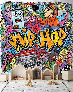 a wall mural with graffiti on it in a children's room