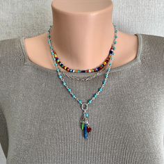 Bohemian Dangle Beaded Chain Necklace, Bohemian Beaded Dangle Chain Necklace, Artisan Turquoise Beaded Chain Necklace, Bohemian Multicolor Crystal Necklace With Beaded Chain, Turquoise Beaded Chain Necklace With Dangle, Spiritual Multi-strand Beaded Chain Necklace, Unique Multicolor Beaded Turquoise Necklace, Multicolor Beaded Chain Pendant Jewelry, Colorful Bohemian Beaded Chain Jewelry