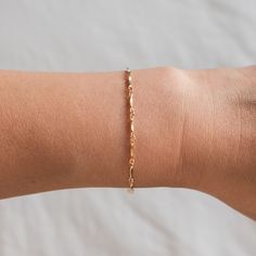 "For those looking for a dainty bracelet that is absolutely darling, meet our Dapped Chain Bracelet. This bracelet is very lightweight and comfortable, making it perfect to wear all the time! Ready for gift giving! . . . . . . . . . . . . . . . . . . . . . . . . . . . . . . . . . . . . . . . . . . BRACELET + Bracelet length: 6.5\" with 1.5\" extender + Gold filled -or- sterling silver chain, lobster clasp, & findings + Matching necklace: https://www.etsy.com/listing/894830947 LAYER LIKE PHOT Dainty Rose Gold Charm Bracelet, Delicate Chain Bracelet With Extender, Delicate Gold Bracelet With Chain As Gift, Dainty Chain Bracelet As Gift, Delicate Chain Bracelet With Jubilee Details As Gift, Delicate Adjustable Charm Bracelet, Delicate Chain Link Bracelet For Gift, Dainty Hypoallergenic Name Bracelet, Delicate Jubilee Chain Bracelet As Gift