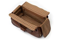 Due to the bespoke nature of this item, it is excluded from promotions. A luxurious rolling suitcase that boasts the perfect union of form and function. Rolling Duffle Bag, Chestnut Leather, Get Better, Corporate Gifts, Chestnut, Trend Setter, Icon Design, Camera Bag, Sunglasses Case