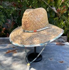 If you like to spend plenty of time at the beach or pool, this straw hat is a must have. Features an adjustable chin cord, funky printed underbrim, and an elastic sweatband for all day comfort. Sizes: M/L - 59cm L/XL - 61cm Beachy Sun Hat, One Size Fits Most, Casual Straw Hat For Pool And Beach Season, Adjustable Sun Hat For Warm Weather Vacation, Adjustable Panama Hat For Sun Protection On Vacation, Adjustable Panama Hat For Beach And Warm Weather, Adjustable Panama Hat For Beach In Warm Weather, Casual Adjustable Hat For Beach Season, Casual Summer Hats With Adjustable Fit, Casual Flat Brim Sun Hat For Beach Season