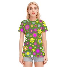 Mod top, 60s style top, Retro Top, Womens Tops, Womens Tshirts, Mod T-shirt, Floral Tshirt, Mod 60s Tshirt, Green T-shirt, Vintage style  100% cotton T-shirt A mod top design I created. Great with wide leg pants, shorts or mini jeans skirt. Anything goes! A super adorable 60s style top find!  Custom sewn and made to order. Designed in California, hand sewn and printed overseas.  ● Fabric: 100% Cotton ● Regular fit ● O-neck, lightweight and breathable, soft and comfortable. ● Fabric weight: 190g/ Retro Fitted Printed T-shirt, Retro Green Printed T-shirt, Retro Printed Crew Neck Top, Retro Tops With Funny Print For Summer, Retro Fitted Green T-shirt, Green Retro Print Short Sleeve Tops, Summer Retro Print Crew Neck Top, Summer Retro Print Graphic Tee Tops, Summer Retro Print Graphic Tee