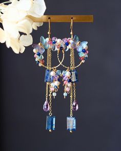 Welcome to visit my Jewelry store:  https://www.etsy.com/shop/Jeansdreamjewelry  Custom order accepted now. Feel free to ask me to see if it is possible. I would love to meet your requirements.  Made to order. Every item will come in a jewelry pouch for safety during travel and gift giving. These dangle earrings are handmade with all natural high quality and well selected gemstones. They are lightweight and comfortable to wear. All materials used are nickel free, friendly to sensitive skin.  🌷MEASUREMENTS Length: 8 cm including ear-wire Width: 2.3 cm 🌷GEMSTONE  🔹Kyanite  🔹Amethyst  🔹Tourmaline 🔹Aquamarine  🔹Freshwater Pearl 🔹Swarovski Crystal  🔹Cat Eye 🔹Czech Lead Glass 🔹Glass Beads  🌷MATERIALS 🔹14K gold filled ear wire, 14K gold filled wrapping wire, 14K gold filled chain 🌷H Czech Glass Earrings Handmade, Spring Jewelry Trends, Kyanite Jewelry, Handmade Jewelry Earrings, Spring Jewelry, Natural High, Jewelry Beads, Beaded Material, Butterfly Charm