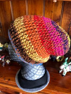 Thick warm slouchy hat. Perfect for a cold winter day. Funky Winter Hat One Size Fits Most, Warm Outdoor Hat One Size, One Size Outdoor Bonnet, Casual Multicolor Warm Beanie, Multicolor Warm Casual Beanie, Warm Multicolor Casual Beanie, Brimmed Multicolor Hats For Fall, Multicolor Brimmed Hats For Fall, Multicolor Brimmed Fall Hats