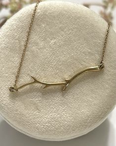 Item Specifications Handmade Yellow Gold This Beautiful Branch Necklace is a unique piece.This would be the perfect gift for any occasion, from wedding anniversaries, to Mother's Day, to graduations and Birthdays ,it's a solid gold  crafted in 14k yellow gold. Branch necklace is a nature-inspired jewelry featuring a pendant designed to resemble the delicate and intricate structure of a tree branch. Pendant measurements: 37mm x 8.5mm Chain Style : Cable chain , spring ring closure Chain measureme Gold Nature-inspired Necklaces For Mother's Day, Unique Gold Necklace For Mother's Day, Nature-inspired Necklace With Adjustable Chain As Gift, Nature-inspired Necklace With Adjustable Chain For Gift, Gold Nature-inspired Necklace For Gift, Unique Necklace With Clavicle Chain For Gift, Unique Clavicle Chain Necklace For Gift, Unique Necklace For Gift, Nature-inspired Yellow Gold Necklace As A Gift