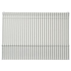 a white and grey striped roman blind