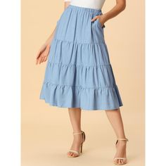 Slant pockets for effortless wear and an A-line tiered flare hem help to create an elegant and flowy look in spring or summer. In a midi length, this skirt with a fit-and-flare silhouette and an elastic waist exudes a carefree summer feel. This midi skirt features a ruffle hem and side pockets for a crisp finish to any look. Pair it with any sandals to create a variety of looks. Ruffle Hem Midi Skirt For Day Out, Summer A-line Ruffled Skirt, Spring Midi Bottoms With Ruffle Hem, Relaxed Tiered Skirt For Spring, Spring Ruffle Hem Maxi Skirt For Day Out, Spring Maxi Skirt With Ruffle Hem For Day Out, Summer Bottoms With Ruffle Hem And Midi Length, Midi-length Ruffled Skirt For Day Out, Midi Length Ruffled Skirt For Day Out