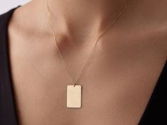 🌟 14K Gold Rectangular Plate Necklace 🌟 Add a touch of elegance and personalization with our 14K Gold Rectangular Plate Necklace. This sleek and versatile piece features a rectangular plate pendant, perfect for engraving a special name, date, or meaningful message. Its clean lines and modern design make it ideal for everyday wear, offering a sophisticated way to keep your most cherished memories close. Whether worn alone or layered with other pieces, this necklace is a timeless and stylish add Rectangular Gold Necklaces For Wedding, Gold Rectangular Necklace For Wedding, Rectangular Gold Necklace For Wedding, Luxury Rectangular Necklace For Anniversary, Luxury Jewelry Gift With Oblong Shape, Fine Jewelry Rectangular Everyday Piece, Classic Rectangular Necklaces Perfect As Gifts, Fine Jewelry For Everyday Wear, Classic Rectangular Necklace For Gift