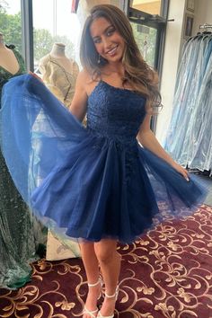 Shedestiny this gown features a round neckline, floral appliques, lace-up back and A-line skirt.#hoco2023#homecomingdresses#formaldresses#homecoming#schooleventdress#holidaydress#graduationdress#cocktaildress Navy Blue Lace Prom Dress, Blue Grad Dresses, Prom Dresses Short Blue, Navy Blue Homecoming Dress, Navy Blue Short Dress, Grad Dresses Short, Dama Dresses, Blue Homecoming Dresses, Tulle Homecoming Dress