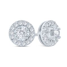 A special look, these diamond stud earrings elevate her attire. Crafted in cool 10K white gold, each earring features a 1/20 ct. diamond - artfully set to enhance size and sparkle - wrapped in a stepped frame of smaller diamonds. Shimmering with 1/3 ct. t.w. of diamonds and a brilliant buffed luster, these post earrings secure comfortably with friction backs. Diamond Frame, Diamond Stud Earrings, Diamond Stud, White Metal, Diamond Stone, Diamond Clarity, Earring Backs, Diamond Earrings Studs, Stone Settings