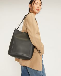 The Studio Bag Black – Everlane Versatile On-the-go Tote Shoulder Bag, Modern Bucket Bag With Leather Handles For On-the-go, Rectangular Bucket Bag With Detachable Strap For Work, Workwear Rectangular Bucket Bag With Removable Pouch, Classic Everyday Box Bag With Adjustable Strap, Classic Crossbody Bucket Bag For Work, Rectangular Workwear Bucket Bag With Removable Pouch, Leather Hobo Bag With Removable Pouch For On-the-go, Versatile Satchel Bucket Bag With Adjustable Strap