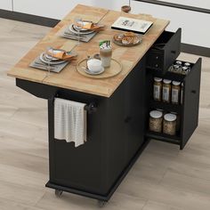 a kitchen island with plates and cups on it