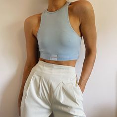 Baby Pastel Blue High Neck Crop Top Brand New With Original Tags. Features A Light Pastel Baby Blue Color, Lightweight Material, Racerback High Neck Design, And Cropped Waistband Pit To Pit 13.5" Length 14" 4253 Blue Tops With Built-in Bra For Everyday, Blue Racerback Crop Top With Built-in Bra, Light Blue Sleeveless Seamless Crop Top, Light Blue Stretch Sleeveless Crop Top, Light Blue Seamless Sleeveless Crop Top, Everyday Blue Tops With Built-in Bra, Everyday Blue Top With Built-in Bra, Chic Blue Seamless Tank Top, Light Blue Fitted Seamless Crop Top