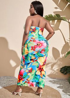 This charming Tropical Floral Print Tube Bodycon Maxi Dress will be sure to make a statement wherever you go. Its strapless tube bodycon design offers a comfortable fit while its tropical floral print injects a splash of color into your wardrobe. Feel confident and glamorous in this eye-catching dress. Fit Type: Slim Fit Fabric: Slight Stretch Material: 95% Polyester, 5% Elastane Care instructions: Machine wash or professional dry-clean Multicolor Floral Print Tube Top For Spring, Fitted Floral Print Strapless Dress For Vacation, Multicolor Floral Print Strapless Tube Top, Green Strapless Dress For Vacation, Multicolor Strapless Floral Print Tube Top, Green Bandeau Strapless Dress For The Beach, Strapless Multicolor Floral Print Tube Top, Green Bandeau Strapless Dress For Beach, Multicolor Tropical Strapless Dress