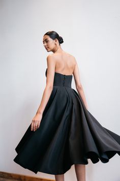 The Carrie dress is a chic and timeless option for all of your bridal events. Featuring an endlessly flattering corseted strapless bodice, and a full circle skirt made for twirling. A-line Strapless Dress For Gala, Strapless A-line Dress With Ruched Bodice For Wedding, Pleated Bodice Strapless Dress For Debutante Ball, Strapless Dress With Pleated Bodice For Debutante Ball, Fitted Strapless Ball Gown For Gala, A-line Gown With Fitted Bodice For Debutante Ball, A-line Strapless Dress For Debutante Ball, Gala Ball Gown Corset Dress With Corset Back, Strapless Ball Gown With Fitted Lined Bodice