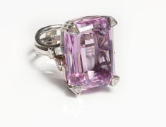 Kunzite Platinum Diamond Statement Ring. Ring is set with fancy cut diamonds and an exceptional kunzite mounted in platinum.Current ring size is 8 and it can be resized to fit. Nowadays, rings come in a variety of interesting designs and high-quality materials, some of which are adorned with precious and semiprecious stones. And when it comes to the vintage and antique ones, you definitely have many exquisite models to explore. We invite you to view our collection of rings. Rings Collection . An Luxury Pink Sapphire Ring For Formal Occasions, Formal Pink Diamond Ring In Platinum, Luxury Pink Topaz Ring With Diamond, Luxury Pink Diamond Ring For Formal Occasions, Luxury Pink Platinum Rings, Luxury Pink Amethyst Ring With Accent Stones, Luxury Pink Topaz Ring, Pink Gemstones With Prong Setting For Formal Occasions, Luxury Pink Sapphire Ring In White Gold