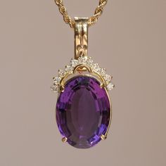 The deep purple of this vintage 14k yellow gold amethyst & diamond pendant just screams royalty. Materials - 14k Yellow Gold, Amethyst, Diamond Dimensions - 38.6mm x 18.7mm Note - Chain not included with purchase *Includes a pearl enhancer clasp on pendant Purple Oval Jewelry With Gemstone Accents, Gold Amethyst Jewelry With Diamond Accents, Purple Oval Jewelry For Formal Occasions, Oval Amethyst Jewelry With Diamond Accents, Amethyst Jewelry In Yellow Gold Stamped 14k, Oval Purple Jewelry With Gemstone Accents, Formal Purple Jewelry With Diamond Accents, Purple Oval 14k Stamped Jewelry, 14k Stamped Yellow Gold Amethyst Jewelry