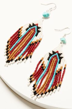 70% glass / 20% semi / 10% brass Silver-toned hardware Turquoise stone accents Multicolored beaded fringe design Genuine stone Imported Beaded Fringe Earrings, Hair Fragrance, Beaded Fringe, Cold Weather Accessories, Earring Sale, Fringe Earrings, Turquoise Stone, Western Fashion, Beaded Earrings