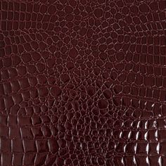 Get red-y to rock with this Brisbane Burgundy Faux Crocodile Patent Leather! In deep wine red, this vinyl features an embossed and shaded crocodile skin pattern, which lends a fascinatingly bumpy texture to an otherwise slick surface. With an off-white backing and quite stiff in drape, craft boxy jackets, fashionable footwear, and excellent accessories like handbags! Totally opaque, a lining isn’t necessary but may be desirable for comfort in wear and a polished finish. 

Note: This product pass Journal Printouts, Fabric Texture Pattern, Minimalist Wardrobe Essentials, Brown Autumn, Night Mode, Snakeskin Pattern, Skin Pattern, Mood Fabrics, Fabric Textures