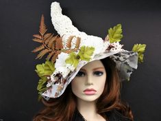 "You can certainly wear this white Raffia straw witch hat all year, but it is specifically designed with Spring and Summer in mind! I chose to make this from Raffia so it would be airy and lightweight, but still shapeable. Firm enough to stand on its own with that classic shape and a sheer floral fabric vinyl brim for shade. Airy enough to get through the heat and folds flat for travel. You can add ribbon ties through the holes in the hat or wear it as is. Some stretch so one size fits most. Hap Whimsical Summer Hats For Country Events, White Curved Brim Mini Hat For Country Events, Whimsical Wide Brim Hat For Spring, Whimsical Brimmed Hats For Country Events, Handmade Wide Brim Costume Hat For Spring, Spring Handmade Wide Brim Costume Hat, Bohemian Brimmed Mini Hats For Garden Party, White Handmade Mini Hats For Kentucky Derby, Handmade White Mini Hats For Kentucky Derby