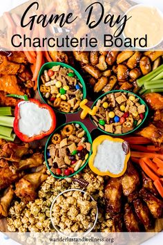 a platter filled with different types of food and the words game day charlotte board