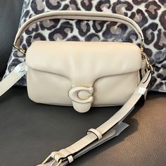 Coach Pillow Tabby 26 Nwt Ivory Chic Cream Coach Shoulder Bag, Beige Coach Bag With Detachable Strap, Classic Cream Shoulder Bag With Detachable Strap, Chic Beige Coach Shoulder Bag, Designer Cream Crossbody Shoulder Bag, Luxury Neutral Crossbody Shoulder Bag, Chic Cream Coach Bag, Designer Cream Bag With Detachable Strap, Coach Cream Rectangular Satchel