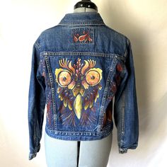 Art To Wear Hand Painted Jean Jacket Stylized Owl Lucky Brand M Painted By St. Helens Artist, Teresa Leonard Stylized Owl With Accents On Front 19.5" Across Chest, 20" Long Button Up Fabric Paint, Washable Hand Painted Jean Jacket, Painted Jean Jacket, Painted Jeans, St Helens, Art To Wear, Fabric Paint, Blue Orange, Jean Coat, Jean Jacket