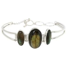 Jay King Gallery Collection Labradorite Toggle Bracelet  With a silhouette similar to a cuff but with the added benefit of a toggle closure, this handcrafted sterling silver and labradorite bracelet is sure to become a favorite jewelry accessory! From Jay's exclusive Gallery Collection.       Approx. 7-1/4"L x 1"W; fits 6-1/2" to 7-1/4" wrist     Stamped .925     Toggle closure     Sterling silver, split-top bracelet has oval, labradorite cabochon bezel-set in center     Center station connects Tab Setting, Split Top, Labradorite Bracelet, Labradorite Cabochon, Beauty Crafts, Toggle Bracelet, Turquoise Cuff, Sterling Silver Cuff Bracelet, Aquamarine Stone