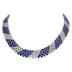 This lovely designed collar necklace by Crivelli is entirely set with 5 rows of round brilliant Diamonds and Blue Sapphires. The alternating stones and the flexibility of the setting will lay beautifully around the neck. The necklace measures 16" long. Diamond weight = 13.16 carats Blue Sapphires weight = 27.21 carats Stamped 750 18K Sapphire Diamond Necklace, Blue Sapphire Jewelry, Diamond Pendants Designs, Blue Sapphire Necklace, Big Necklace, Diamond Necklace Designs, Starry Nights, Jewelry Brands, Antique Jewelry Indian