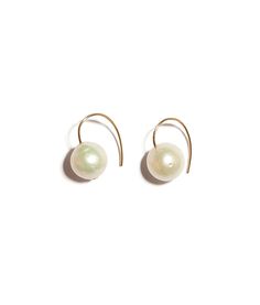 Your favorite best seller is back and brighter than ever in two new stunning hues! Embrace your singular style in a pair of earrings as immaculately chic as the day is long. Choose between Frost, Blush, or Midnight colored delicate gold-fill wire earrings with freshwater pearl drops. Gold-fill, freshwater pearl Drop: 0.7" Ships in 1-3 days For information on how to care for this piece, visit our Customer Care page Girl With Pearl Earring, Pearl Cluster Earrings, Diy Jewelry Rings, Hoop Charms, Lizzie Fortunato, Pearl Cluster, Wire Earrings, Fine Earrings, Girls Earrings