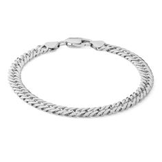 From the Made in Italy Collection, this 120 gauge Cuban curb chain bracelet set in sterling silver measures 8.5 inches in length and secures with a lobster claw clasp. Sterling Silver Curb Chain Bracelet With Oval Links, Classic Silver Cuban Link Bracelet With Oval Links, Classic Silver Cuban Link Bracelet, Classic Cuban Link Silver Chain Bracelet, Modern Bracelet With Curb Chain And Oval Links, Sterling Silver Link Bracelet With Curb Chain For Everyday, Sterling Silver Curb Chain Bracelet For Everyday, Silver Cuban Link Jubilee Bracelet For Everyday, White Gold Curb Chain Bracelet