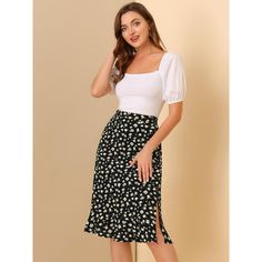 Through the summer seasons in this effortlessly chic flowy skirt. In a midi silhouette that wraps around, this skirt exudes the spring-summer feel you can't wait for. Sitting high on the waist, the light and breezy fabric trimmed with ruffles falls to a split skirt for impact and movement as you walk. Cut in a flared shape, this skirt is designed with a button closure at the side flattering for showing your looming legs. Adding a beautiful floral flourish for feminine appeal, this style is a fus Elegant Summer Pencil Skirt For Day Out, Summer Rayon Skirt For Brunch, Rayon Midi Maxi Skirt For Day Out, Chic Summer Midi Pencil Skirt, Summer Wrap Skirt For Brunch, Lined, Summer Brunch Wrap Skirt With Lined Detail, Summer Brunch Wrap Skirt With Lining, White Midi Length Pencil Skirt For Summer, Feminine Summer Lined Wrap Skirt