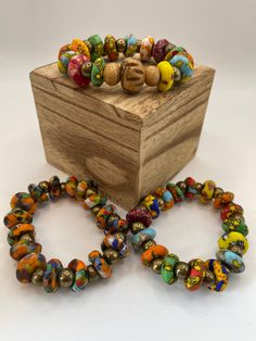 Women's Bohemian Multi Colored  Uniquely Styled Beaded Stretch Bracelet Cheap Colorful Hippie Beads, Luxury Multicolor Large Beads, Multicolor Bohemian Beaded Bracelets, Bohemian Bangle Bracelets With Gold Beads, Bohemian Bangle Bracelet With Gold Beads, Hippie Style Multicolor Round Beaded Bracelets, Hippie Style Multicolor Round Bead Bracelets, Artisan Multicolor Beaded Bracelets For Beach, Bohemian Stretch Bracelet With Spacer Beads For Festivals