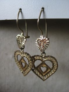 14K Heart Filigree Dangle Yellow Gold Earrings Vintage Karat KT Solid Pierced Drop Materials: 14K solid gold metal marked (14K) Condition: excellent vintage with wear Weight in grams - 2.68 Measures - 40mm x 17mm Maker's mark - D Questions welcome. Wedding Double Heart Pierced Earrings, Hallmarked Heart Earrings For Wedding, 14k Gold Filigree Earrings For Anniversary, Gold Double Heart Earrings For Formal Occasions, Wedding Hallmarked Heart Earrings, Vintage Gold Heart Drop Earrings, Yellow Gold Double Heart Earrings For Wedding, Gold Double Heart Earrings For Anniversary, Vintage Gold Earrings For Valentine's Day